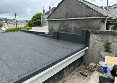 Newly installed flat roof with tar material